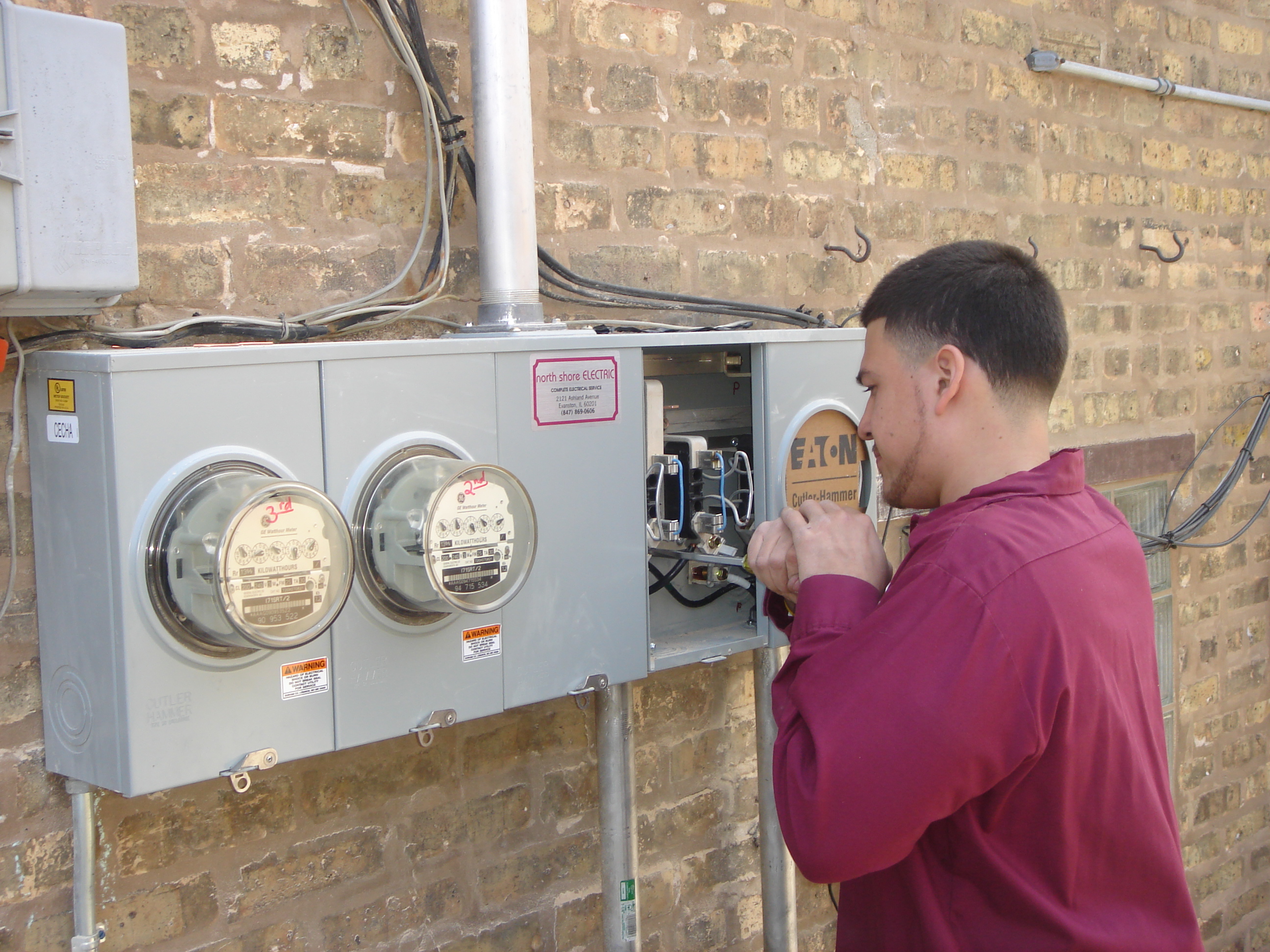 NSE Electrician Working on a Service